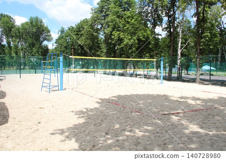 Empty beach volleyball court in summer park 140728980