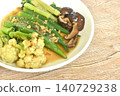 stir fried cauliflower and roselle with cabbage topping black mushroom in gravy garlic soy sauce on plate 140729238