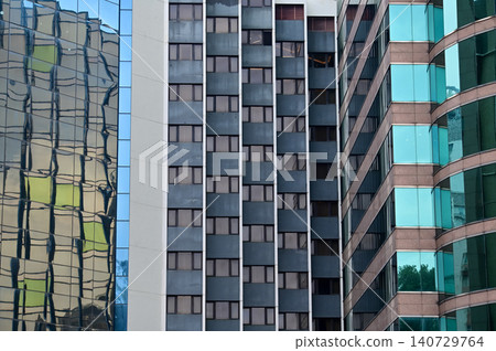 Windows of business building. Modern city building. Building abstract. Building background. Windows of business building. Modern city building. Building abstract. Building background. 140729764