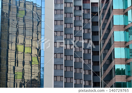 Windows of business building. Modern city building. Building abstract. Building background. Windows of business building. Modern city building. Building abstract. Building background. 140729765
