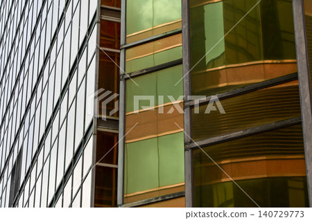 Windows of business building. Modern city building. Building abstract. Building background. Windows of business building. Modern city building. Building abstract. Building background. 140729773