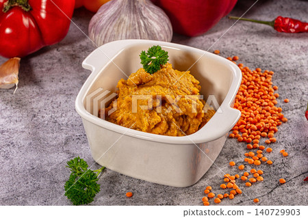 Red Lentil Puree Bowl Garnished Parsley. Indian Dal Red Lentil Puree Bowl Garnished Parsley. Indian Dal 140729903