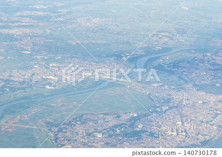 Aerial view of Abiko City, Toride City, and the area around the Tone River. Aerial view of Abiko City, Toride City, and the area around the Tone River. 140730178