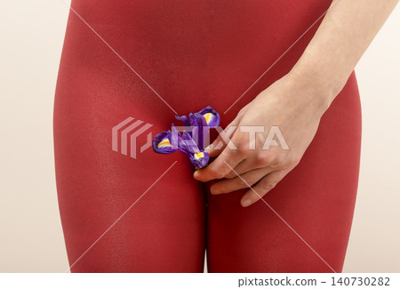 Female body with iris flower symbolizing fertility and reproductive system. Botanical element used for wellness and sexuality concept representation. Concept of feminine care awareness.. Female body with iris flower symbolizing fertility and reproductive system. Botanical element used for wellness and sexuality concept representation. Concept of feminine care awareness.. 140730282