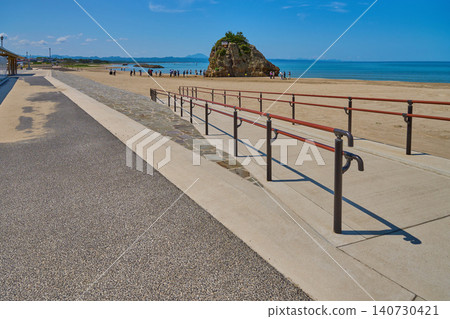 View of Inasa Beach and Benten Island in Taisha-cho, Izumo City, Shimane Prefecture in spring, from the northern slope. View of Inasa Beach and Benten Island in Taisha-cho, Izumo City, Shimane Prefecture in spring, from the northern slope. 140730421