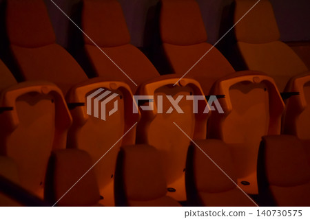 Empty chairs in the stadium. Empty seats in the stadium. Sport background pattern photo. Patterns of chairs in a theater. Seats background pattern photo. Empty chairs in the stadium. Empty seats in the stadium. Sport background pattern photo. Patterns of chairs in a theater. Seats background pattern photo. 140730575