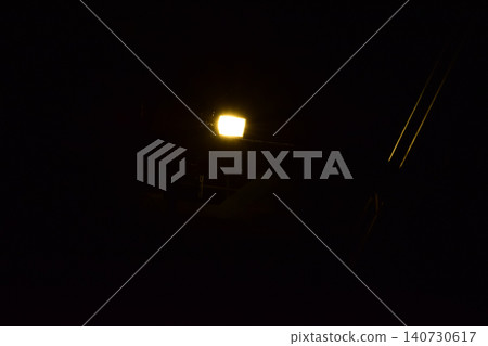 Set of professional stage lighting equipment on the stage for gig illumination of theater or concert hall. Stage lights, spotlights and laser beams. Rays of light from the floodlights. Concert light. Set of professional stage lighting equipment on the stage for gig illumination of theater or concert hall. Stage lights, spotlights and laser beams. Rays of light from the floodlights. Concert light. 140730617