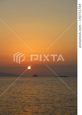 sunset on the beach. Seaside town of Turgutreis and spectacular sunsets. Selective Focus. sunset on the beach. Seaside town of Turgutreis and spectacular sunsets. Selective Focus. 140731784