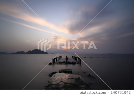 sunset on the beach. Seaside town of Turgutreis and spectacular sunsets. Selective Focus. Long Exposure shoot. tranquility scene. sunset on the beach. Seaside town of Turgutreis and spectacular sunsets. Selective Focus. Long Exposure shoot. tranquility scene. 140731942