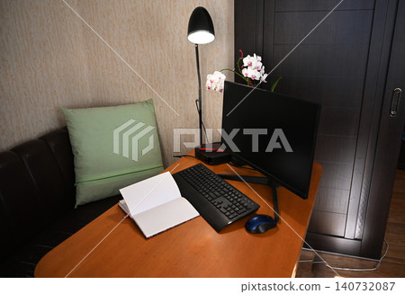 Small office with desk and couch setup Small office with desk and couch setup 140732087