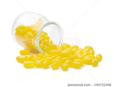 Tasty small lemon drops isolated on white Tasty small lemon drops isolated on white 140732406