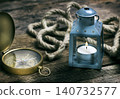 Candle, compass and rope 140732577