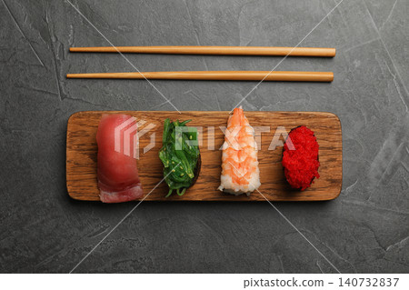 Set of delicious sushi on grey table, flat lay Set of delicious sushi on grey table, flat lay 140732837