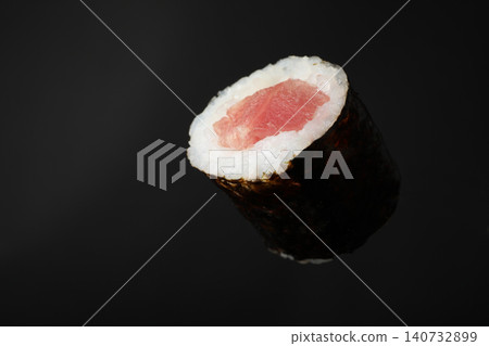 Sushi roll with tuna on black background Sushi roll with tuna on black background 140732899
