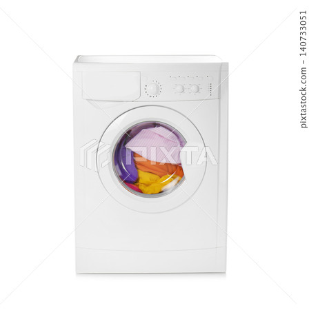 Modern washing machine with laundry isolated on white Modern washing machine with laundry isolated on white 140733051