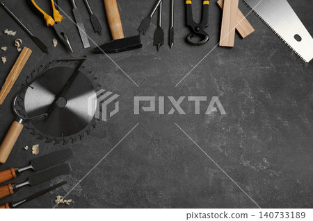 Flat lay composition with carpenter's tools on grey background. Space for text Flat lay composition with carpenter's tools on grey background. Space for text 140733189