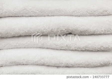 White clean light towels soft hygiene home object bathroom background White clean light towels soft hygiene home object bathroom background 140733777