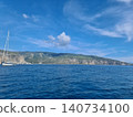 Vessel at a bay, enjoying the scenic views of the coastline 140734100