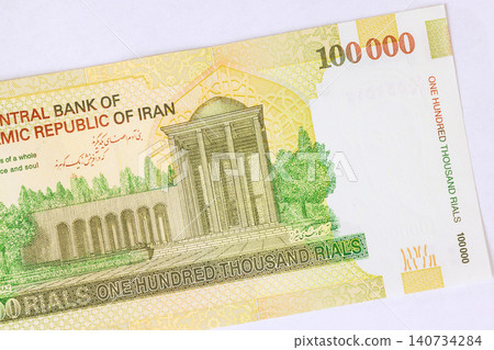 Iranian 100000 Rial currency IRR cash banknote issued by Central Bank of Islamic Republic of Iran Iranian 100000 Rial currency IRR cash banknote issued by Central Bank of Islamic Republic of Iran 140734284