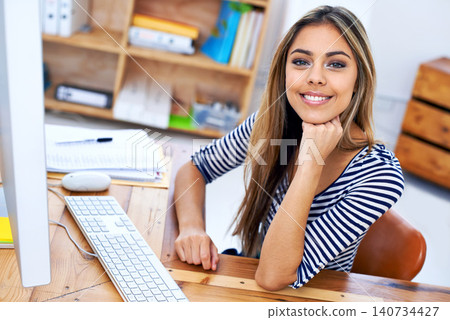 Desk, computer and portrait of woman, internship and art director in creative company with technology. Adult, girl and female person in business to work as employee, online and app with internet 140734427