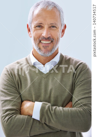 Portrait, arms crossed and happy business man in office, startup company or creative career. Designer, entrepreneur and face of mature man for management, professional or development in workplace Portrait, arms crossed and happy business man in office, startup company or creative career. Designer, entrepreneur and face of mature man for management, professional or development in workplace 140734517