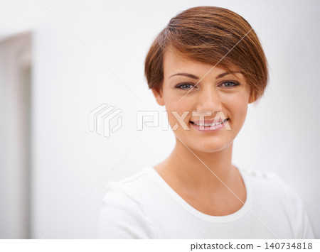 Portrait, smile and home with woman, mockup space and wall background with confidence and casual. Face, person and apartment with girl and comfort with peace and calming with happiness and relaxing 140734818