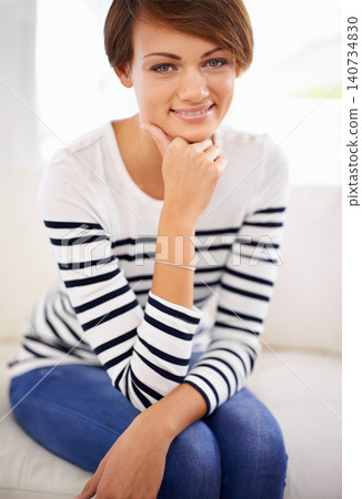 Home, fashion and portrait of happy woman to relax on sofa in lounge on vacation or holiday. Calm, break and girl with smile in casual clothes or pride for style in apartment on couch in living room Home, fashion and portrait of happy woman to relax on sofa in lounge on vacation or holiday. Calm, break and girl with smile in casual clothes or pride for style in apartment on couch in living room 140734830