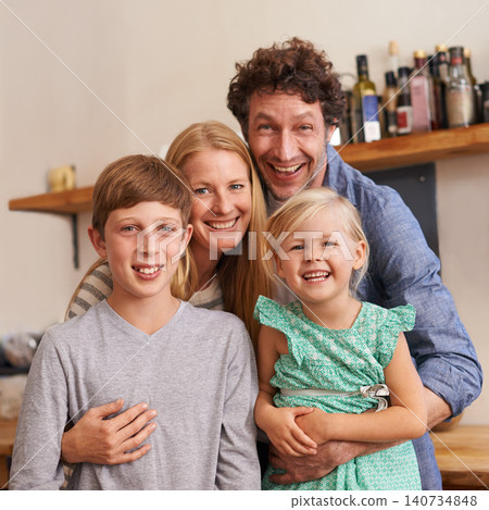 Parents, family and portrait with children in kitchen for holiday relax or together for weekend, good mood or bonding. Mother, father and siblings or face in apartment for happy, vacation or break Parents, family and portrait with children in kitchen for holiday relax or together for weekend, good mood or bonding. Mother, father and siblings or face in apartment for happy, vacation or break 140734848