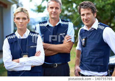 Security, law enforcement and portrait of police team outdoors for crime, protection and safety service. Guard, collaboration and officers with crossed arms for patrol, justice and surveillance Security, law enforcement and portrait of police team outdoors for crime, protection and safety service. Guard, collaboration and officers with crossed arms for patrol, justice and surveillance 140735769