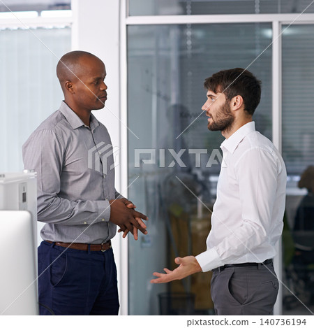 Men, discussion and conversation in hallway at office for ideas, listen or collaboration at company. Business people, teamwork and diversity with advice for questions in workplace at corporate agency Men, discussion and conversation in hallway at office for ideas, listen or collaboration at company. Business people, teamwork and diversity with advice for questions in workplace at corporate agency 140736194