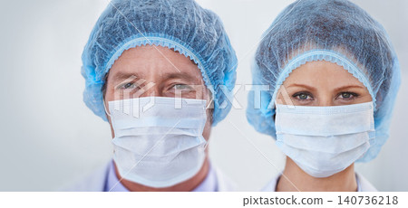 Face mask, doctors and portrait with surgery and safety gear for healthcare and wellness job. Hospital, ppe and people in clinic with working and health protocol in facility with care and staff Face mask, doctors and portrait with surgery and safety gear for healthcare and wellness job. Hospital, ppe and people in clinic with working and health protocol in facility with care and staff 140736218