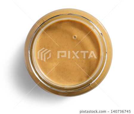 peanut butter in glass jar peanut butter in glass jar 140736745