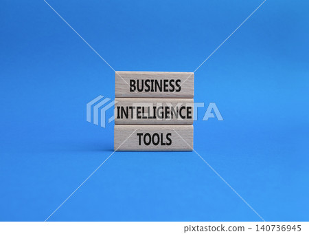 Business Intelligence Tools symbol. Concept word Business Intelligence Tools on wooden blocks. Beautiful blue background. Business and Business Intelligence Tools. Copy space Business Intelligence Tools symbol. Concept word Business Intelligence Tools on wooden blocks. Beautiful blue background. Business and Business Intelligence Tools. Copy space 140736945