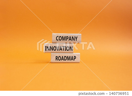Company innovation roadmap symbol. Concept word Company innovation roadmap on wooden blocks. Beautiful orange background. Business and Company innovation roadmap. Copy space Company innovation roadmap symbol. Concept word Company innovation roadmap on wooden blocks. Beautiful orange background. Business and Company innovation roadmap. Copy space 140736951