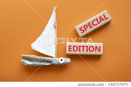 SPECIAL EDITION symbol. Concept word SPECIAL EDITION on wooden blocks. Beautiful orange background with boat. Business and SPECIAL EDITION concept. Copy space SPECIAL EDITION symbol. Concept word SPECIAL EDITION on wooden blocks. Beautiful orange background with boat. Business and SPECIAL EDITION concept. Copy space 140737075