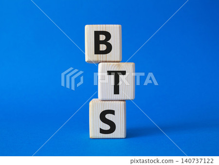 BTS symbol. Wooden cubes with word BTS. Beautiful blue background. BTS concept. Copy space. BTS symbol. Wooden cubes with word BTS. Beautiful blue background. BTS concept. Copy space. 140737122