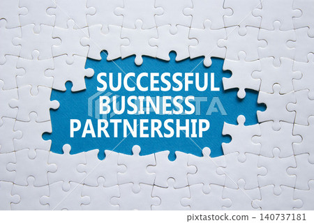 Successful Business Partnership symbol. White puzzle with words Successful Business Partnership. Beautiful blue background. Business concept. Copy space. Successful Business Partnership symbol. White puzzle with words Successful Business Partnership. Beautiful blue background. Business concept. Copy space. 140737181