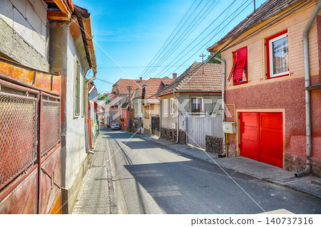 Amazing old streets with colorful houses in the medieval city-fortress Sighishoara. Amazing old streets with colorful houses in the medieval city-fortress Sighishoara. 140737316