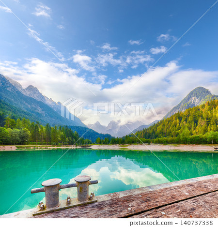Gorgeous landscape on Jasna lake with beautiful reflections of the mountains. Gorgeous landscape on Jasna lake with beautiful reflections of the mountains. 140737338