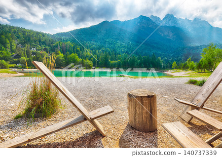 Gorgeous landscape on Jasna lake with beautiful reflections of the mountains. Gorgeous landscape on Jasna lake with beautiful reflections of the mountains. 140737339