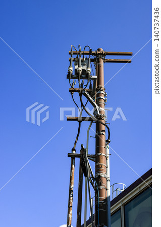 High voltage post, High voltage tower, show with high voltage construction and power lines. High voltage post, High voltage tower, show with high voltage construction and power lines. 140737436