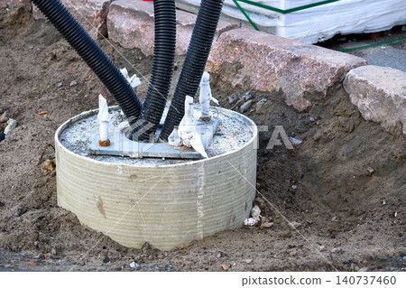 Concrete base for lighting pole with insulated cables 140737460
