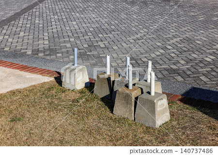 Concrete base for a umbrella, cement parasol holder for protect person against sun. Concrete base for a umbrella, cement parasol holder for protect person against sun. 140737486