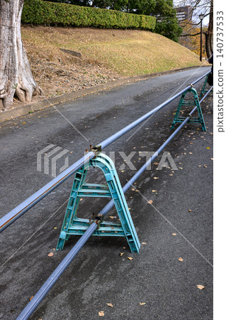 The MovablThe Movable metal fence forbids from approaching the walkway.e metal fence forbids from approaching the walkway. The MovablThe Movable metal fence forbids from approaching the walkway.e metal fence forbids from approaching the walkway. 140737533