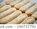 Sugar coated ladyfinger biscuits arranged for making tiramisu 140737792