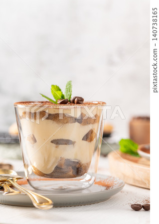 Gourmet Tiramisu Dessert in Glass with Mint Leaf 140738165