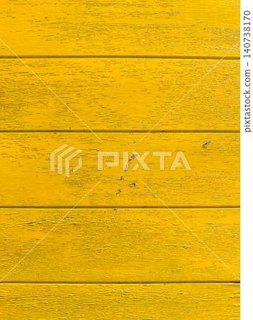 Bright yellow painted wooden planks showing charming weathered textures and distressed details perfect for a vibrant and rustic background design Bright yellow painted wooden planks showing charming weathered textures and distressed details perfect for a vibrant and rustic background design 140738170