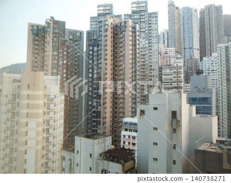 Towering clusters of high-rise apartment buildings Towering clusters of high-rise apartment buildings 140738271