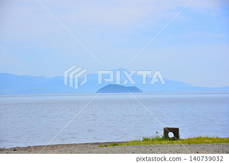 《Shiga Prefecture》 Chikubu Island and Mount Ibuki floating on Lake Biwa in the fresh greenery. 《Shiga Prefecture》 Chikubu Island and Mount Ibuki floating on Lake Biwa in the fresh greenery. 140739032