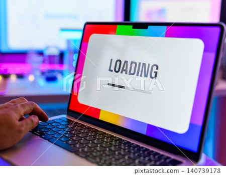 Laptop and hand loading 140739178